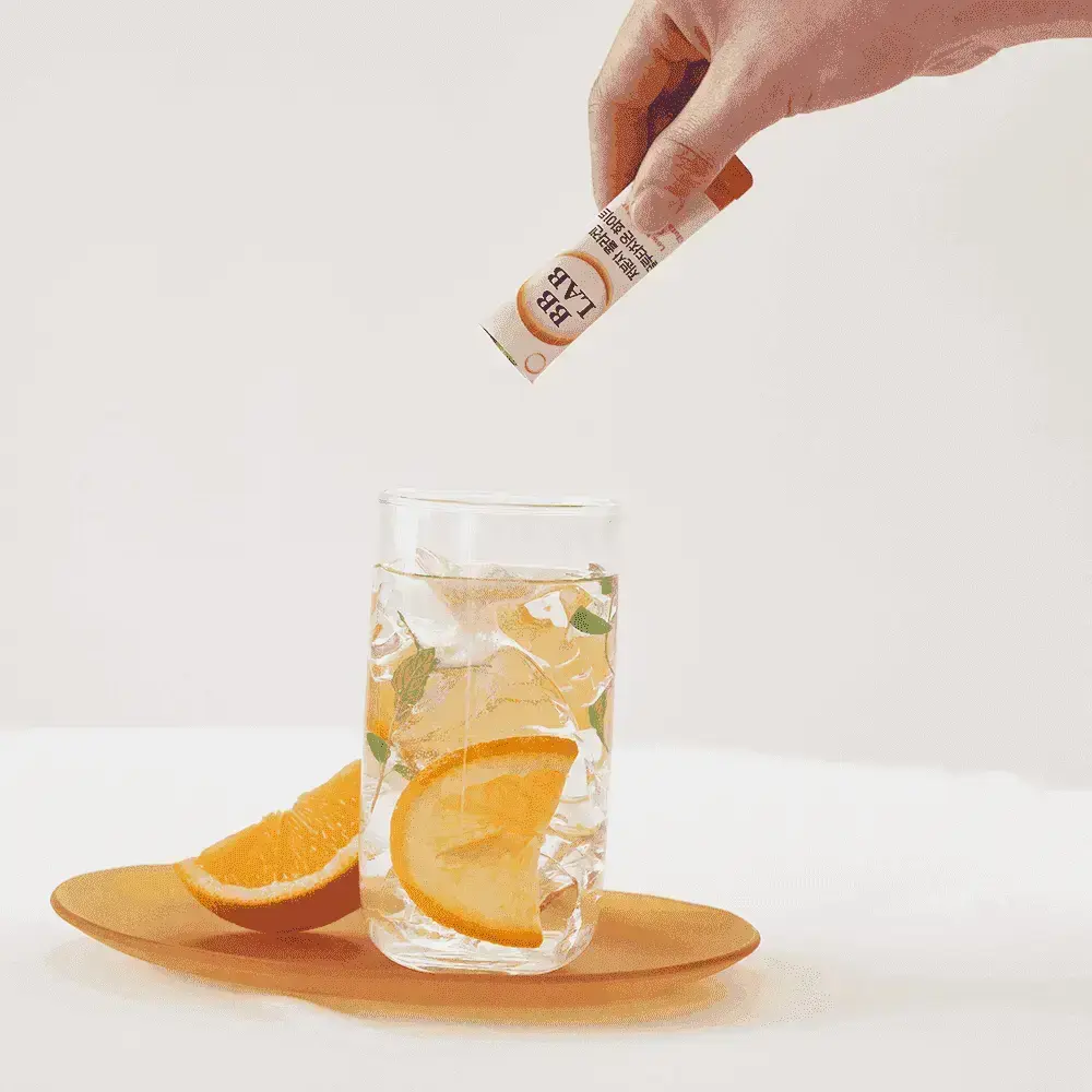 BB Lab collagen stick being added to a glass of water