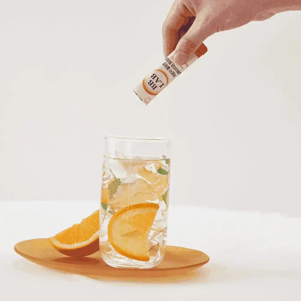 BB Lab collagen stick being added to a glass of water